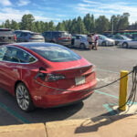 electric vehicles charging at a park