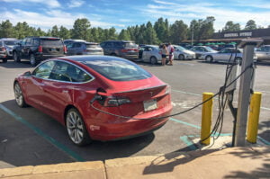 electric vehicles charging at a park
